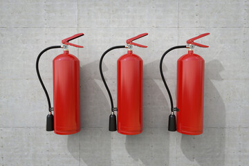 Obraz premium Group of fire extinguishers handing on wall