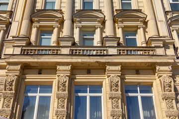 Fototapeta premium Moscow, Russia, April 6, 2022. Typical historical architectural in downtown, Kuznetsky most street, facade fragment