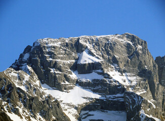 Snow-capped alpine peak Bös Fulen (Boes Fulen or Bos Fulen, 2801 m), the highest peak in the canton of Schwyz situated in the Schwyz Alps mountain massif - Canton of Glarus, Switzerland / Schweiz