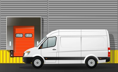 Van cargo van at the gate of a warehouse logistics center, close-up.