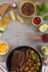 Traditional lunch American cooking grilled steak and various vegetables