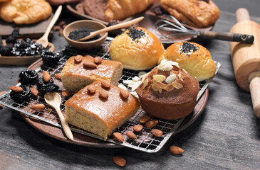 Bread and Whole Grain Cake, Almond and Black Sesame soft focus.