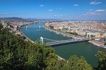 Budapest, Hungary. High angle view on the city with main landmarks and Danube river with bridges. View from Gellert Hill. - 498058805