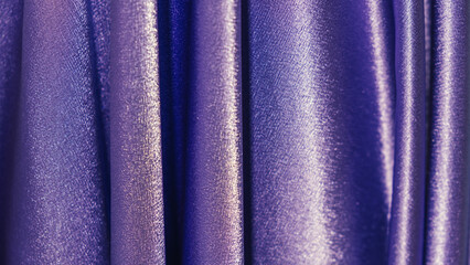 purple draped shiny fabric background