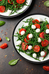 Fresh Samphire salad with cherry tomatoes and mozzarella. Healthy food.