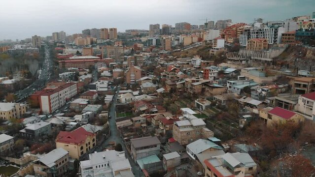 Aerial view of beautiful ancient historical city on hills, houses and streets in Ancient city Erevan. Travel concept. High quality 4k footage