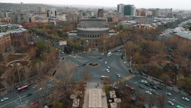  Opera and Ballet House on Freedom Square with spring tree and car square and road. Aerial view. Erevan, Armenia. High quality 4k footage