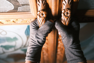 Burglar hand open a door close up ,