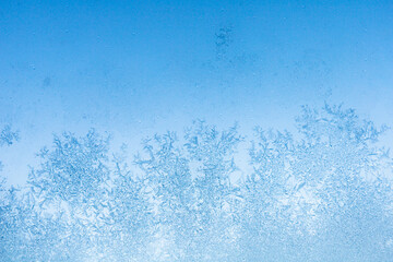 pattern of blue ice on glass