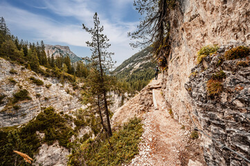 Fototapeta na wymiar Landscape of Dolomites fanes valley. Hiking nature scenery in dolomite, italy near Cortina d'Ampezzo. The Fanes waterfalls, Dolomites, Italy. Via Ferrata Lucio Dalaiti