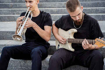 Obraz premium Young street music band play a lot of musical instruments