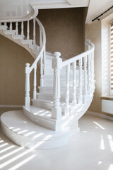 white wooden stairs in the new interior of the house