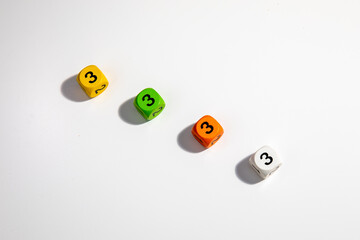 Colorful play dice with numbers on White Background