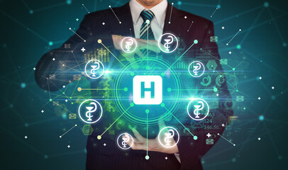 Hand holding healthcare icons concept