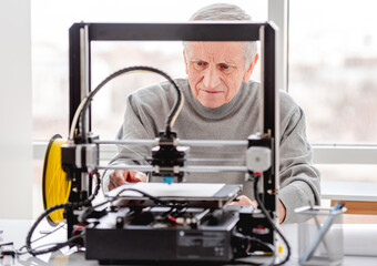 Man with 3D printer