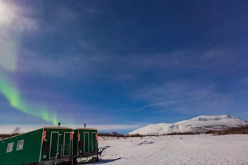 Fotobehang Northern Lights,Sami people.sky,Abisko,north lights,snow,night,winter,cold,nature,astronomy,solar wind,iceland,landscape,Norway,Sweden,Canada,landscape,colors,stars,arctic circle,north pole,universe,a © Claudio Quacquarelli