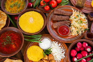 Homemade Romanian Food with 
pies, polenta, borscht, vegetables, fish, meat, stew, cheese and wine. Traditional dishes from Romania and the Republic of Moldova.