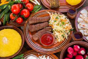 Homemade Romanian Food with 
pies, polenta, borscht, vegetables, fish, meat, stew, cheese and wine. Traditional dishes from Romania and the Republic of Moldova.