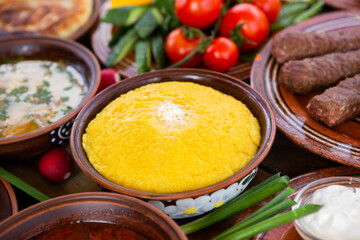Homemade Romanian Food with 
pies, polenta, borscht, vegetables, fish, meat, stew, cheese and wine. Traditional dishes from Romania and the Republic of Moldova.