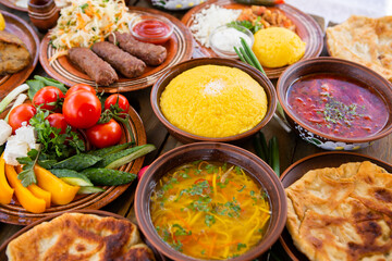 Homemade Romanian Food with 
pies, polenta, borscht, vegetables, fish, meat, stew, cheese and wine. Traditional dishes from Romania and the Republic of Moldova.
