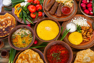 Homemade Romanian Food with 
pies, polenta, borscht, vegetables, fish, meat, stew, cheese and wine. Traditional dishes from Romania and the Republic of Moldova.