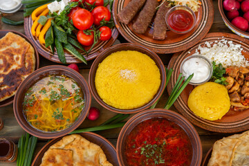 Homemade Romanian Food with 
pies, polenta, borscht, vegetables, fish, meat, stew, cheese and wine. Traditional dishes from Romania and the Republic of Moldova.