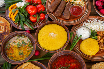 Homemade Romanian Food with 
pies, polenta, borscht, vegetables, fish, meat, stew, cheese and wine. Traditional dishes from Romania and the Republic of Moldova.
