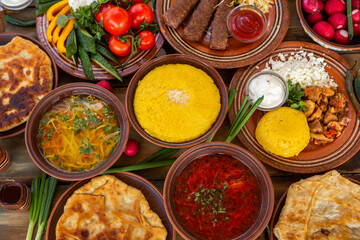 Homemade Romanian Food with 
pies, polenta, borscht, vegetables, fish, meat, stew, cheese and wine. Traditional dishes from Romania and the Republic of Moldova.