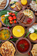 Homemade Romanian Food with 
pies, polenta, borscht, vegetables, fish, meat, stew, cheese and wine. Traditional dishes from Romania and the Republic of Moldova.