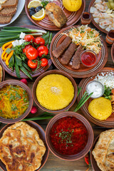Homemade Romanian Food with 
pies, polenta, borscht, vegetables, fish, meat, stew, cheese and wine. Traditional dishes from Romania and the Republic of Moldova.