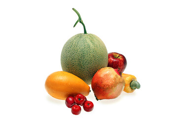 A composition with various Brazilian fruits on a white background.