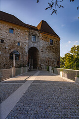 Front entrance of Ljubljana castle up on the hill in a sunny autumn day