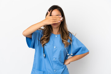 Young surgeon doctor woman over isolated white wall covering eyes by hands. Do not want to see...