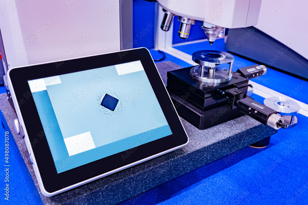 Poster electron microscope with digital panel. tablet transmits data from microscope. research equipment. d