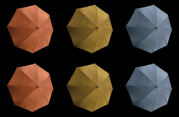 Top view, Collection set three colours umbrella isolated on black background, stock photo, invesment, business, summer concept, orange gold pastel blue violet colors