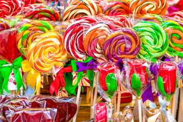 Delicious colorful lollipops, candy are sold in the shop. Sweet background.