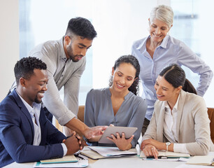 Collaboration is everything. Shot of a group of businesspeople brainstorming and exchanging ideas in a modern office.