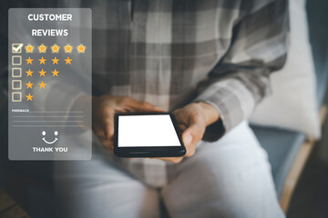 Customer service and Satisfaction concept ,Women hand hold smart phone empty screen choose the 5 star icon to give satisfaction in service. rating very impressed in coffeeshop.