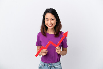 Young Vietnamese woman isolated on white background holding a catching a rising arrow with happy expression