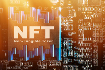 NFT Non fungible token. NFT on motherboard. Crypto art concept.