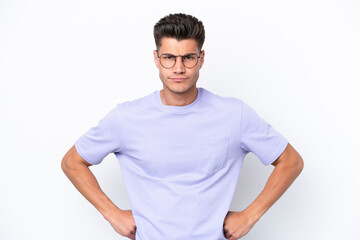 Young caucasian man isolated on white background angry