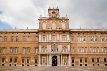 Fototapeta na wymiar Facade of the Ducal Palace of Modena, in the past residence of the Este Dukes of Modena and today houses the Italian Military Academy.