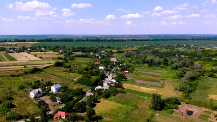 Fototapeta na wymiar Aerial view. A beautiful Ukrainian village in a picturesque landscape. Ukraine