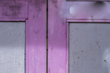old wooden door in violet and gray.