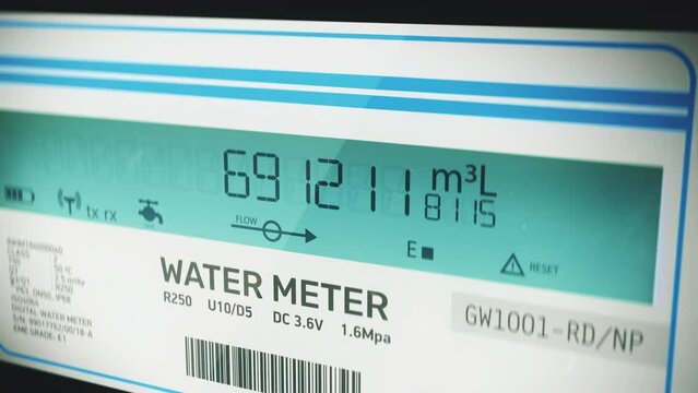 Smart water meter display showing volume of cubic liters used by residence. Digital metric water meter measuring water usage