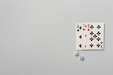 Playing cards and dices on color background. Gambling concept. Top view