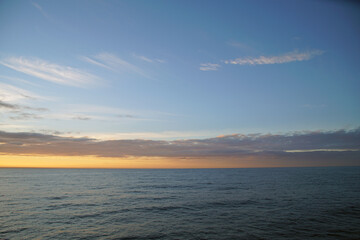 Early morning on the open ocean. The horizon is waiting for the sun. Space before sunrise