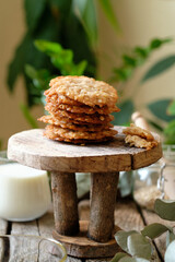 Honey oatmeal chip cookies. Side view. Milk.