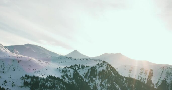 Sunset with lens flare in the Carpathian mountains romania borsa