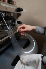 sommelier man wiping dishes decanter for wine.